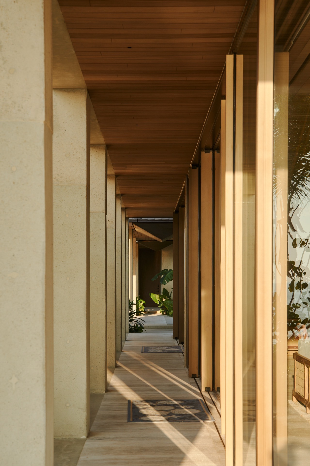 Interior corridor — tornillo ceiling and limestone walls